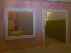 a pink painted loft bed