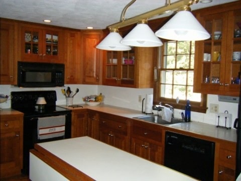 A large kitchen with wooden cabinets