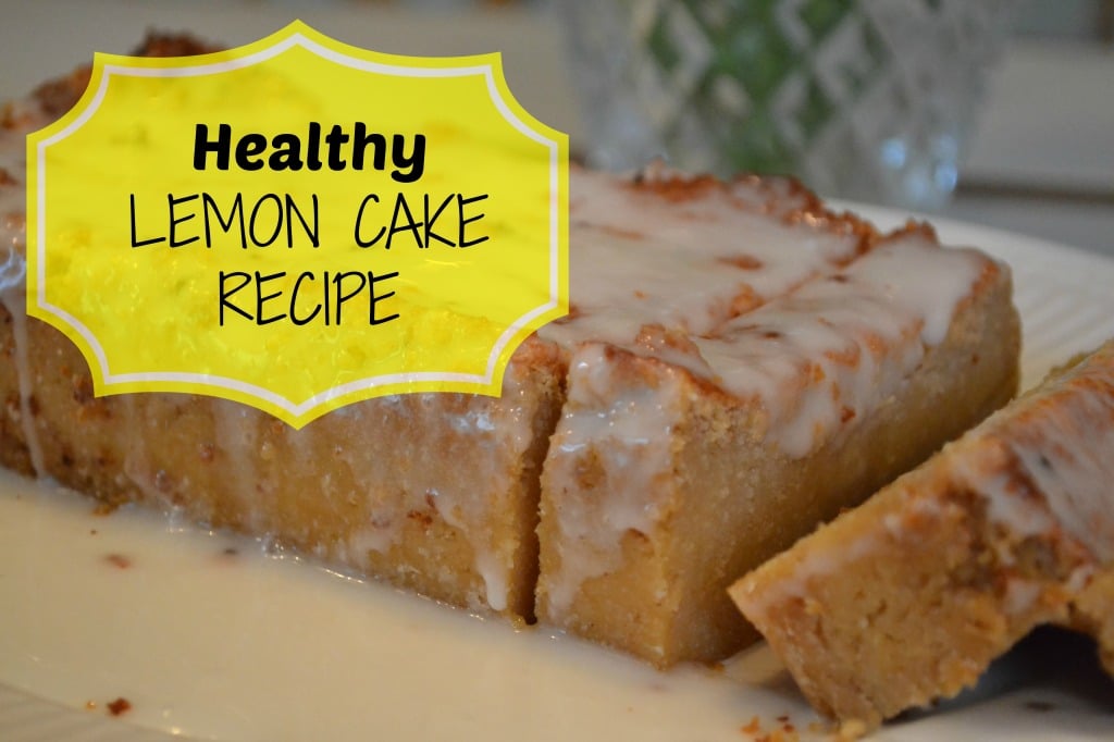 glazed lemon cake with two slices cut