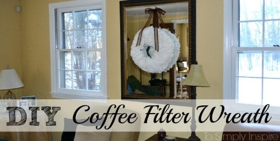 a white coffee filter wreath on a big mirror 