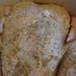 raw whole chicken in a slow cooker