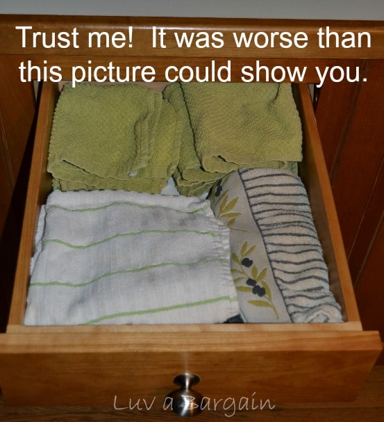 folded dish towels in a drawer