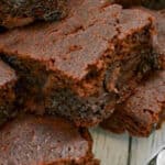 Healthy Gluten Free Brownies stacked on a glass plate