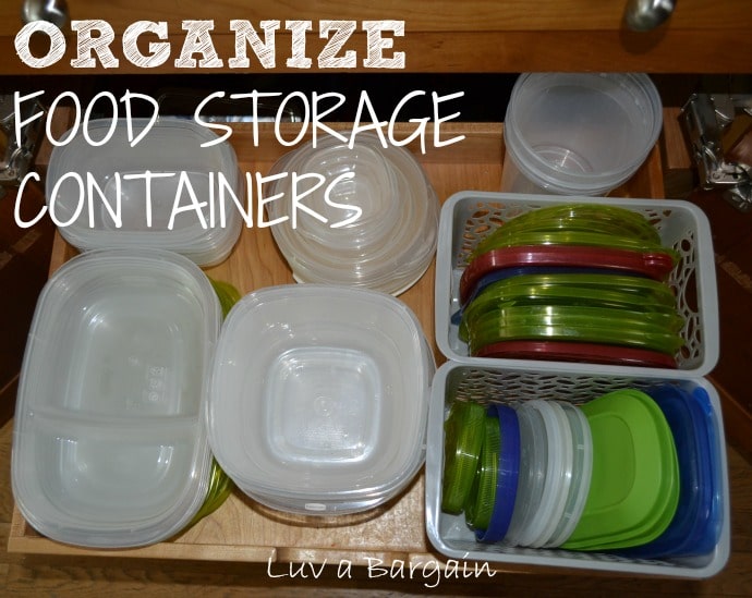 a cabinet drawer with plastic containers and baskets