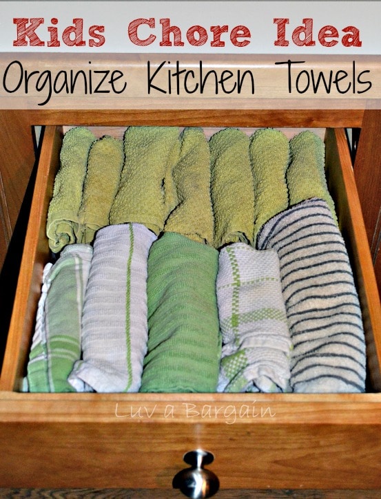 a drawer full of rolled dish towels 