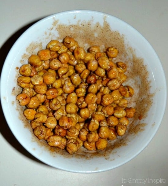 Uncooked Chickpeas mixed in maple cinnamon mixture