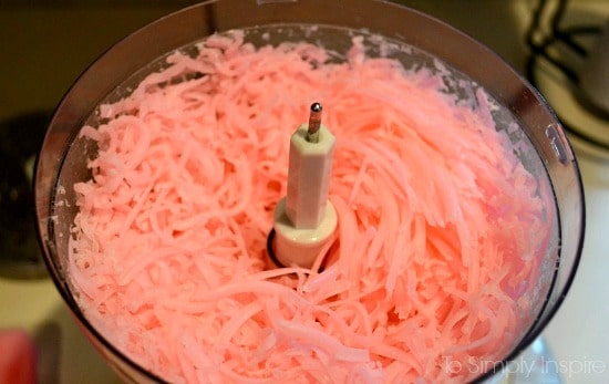 a food processor with shredded zote soap