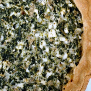 closeup of spinach pie in a pie crust