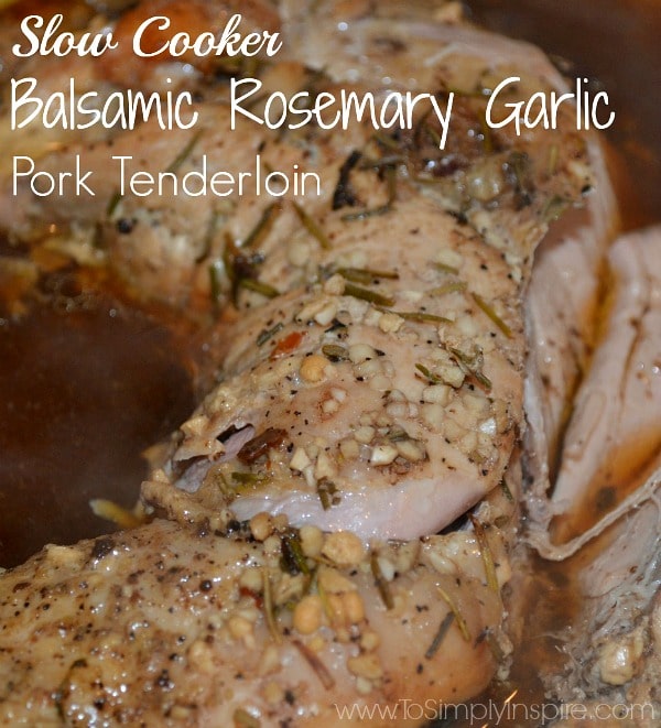 This Slow Cooker Balsamic Garlic Pork Tenderloin is so delicious and juicy! Healthy and easy to prepare to have ready when you get home from a long day. A close up of pork tenderloin in brown sauce with garlic in a slow cooker