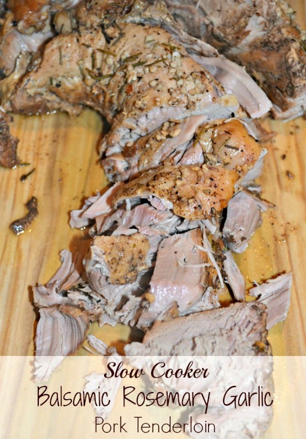 Balsamic Garlic Pork Tenderloin chopped on a cutting board