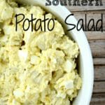 southern style potato salad in a white bowl with txt overlay