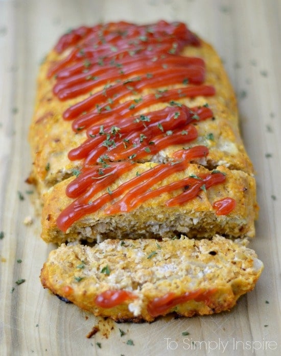 A close up of turkey meatloaf with ketchup on top