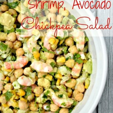 shrimp, chickpea, avocado and corn salad in a white bowl