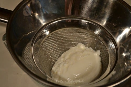add yogurt to strainer