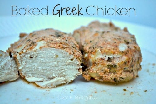 chicken breasts cooked in greek seasonings on a white plate.