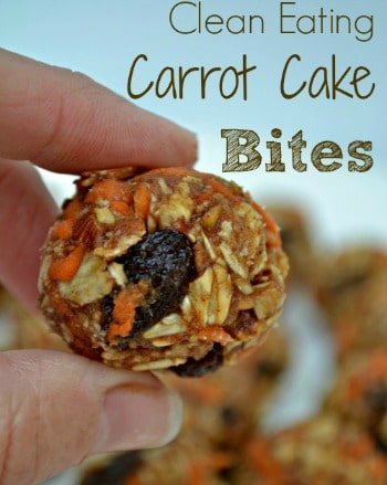 closeup of a carrot cake bites with raisins held by fingertips