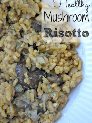 a white bowl with mushrooms and risotto rice