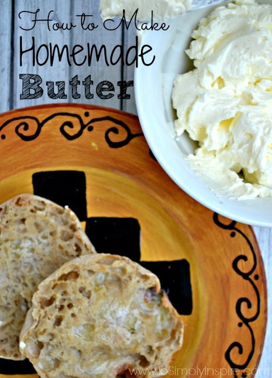 a bowl of homemade whipped butter beside a plate with english muffins