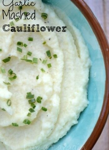 closeup of mashed cauliflower in a light blue bowl