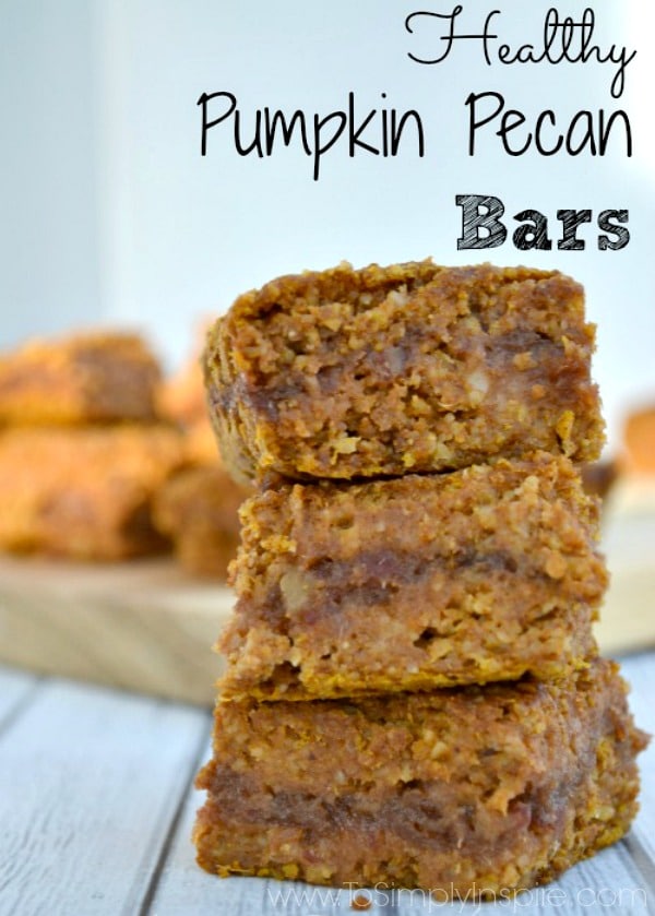 These Pumpkin Pecan Bars are perfect with a cup of coffee in the morning or a cup of tea in the afternoon. Healthy swaps are made so there is no refined sugar or butter. Three Pumpkin Pecan Bars stacked on top of each other