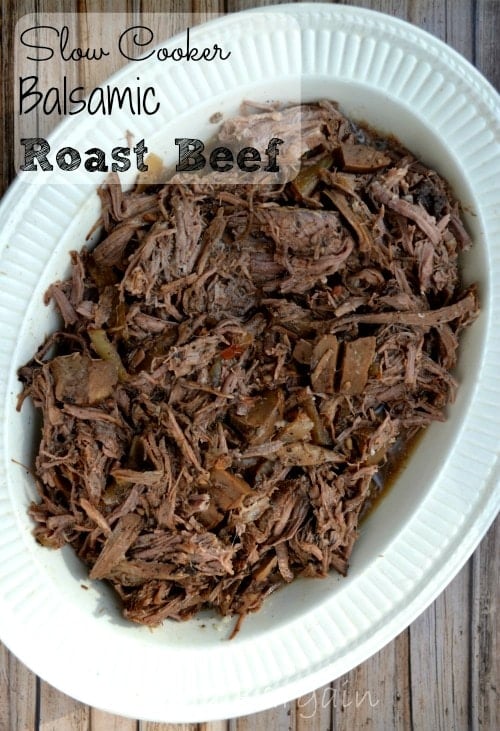 shredded roast beef in a white oval bowl