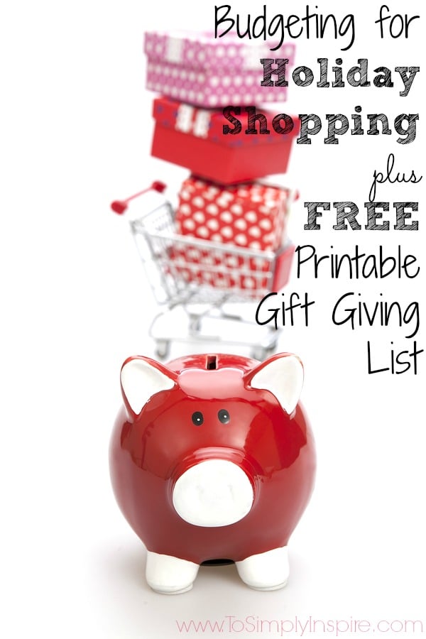 a red pig bank with red polka dot gift boxes on top of a shopping cart