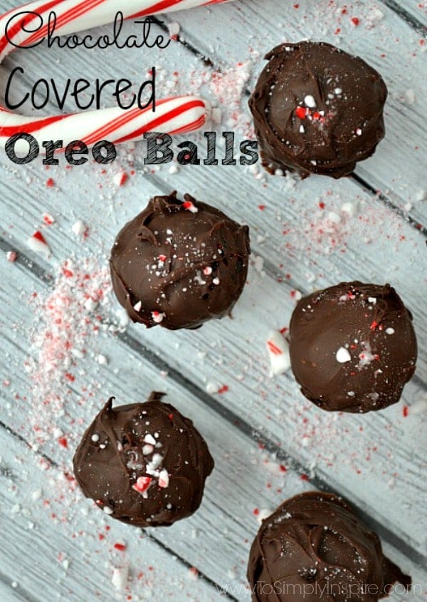 Oreo Balls on a table with crushed candy canes