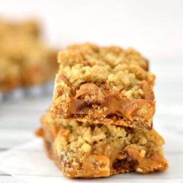 A close up of a stack of two Carmelita dessert bars