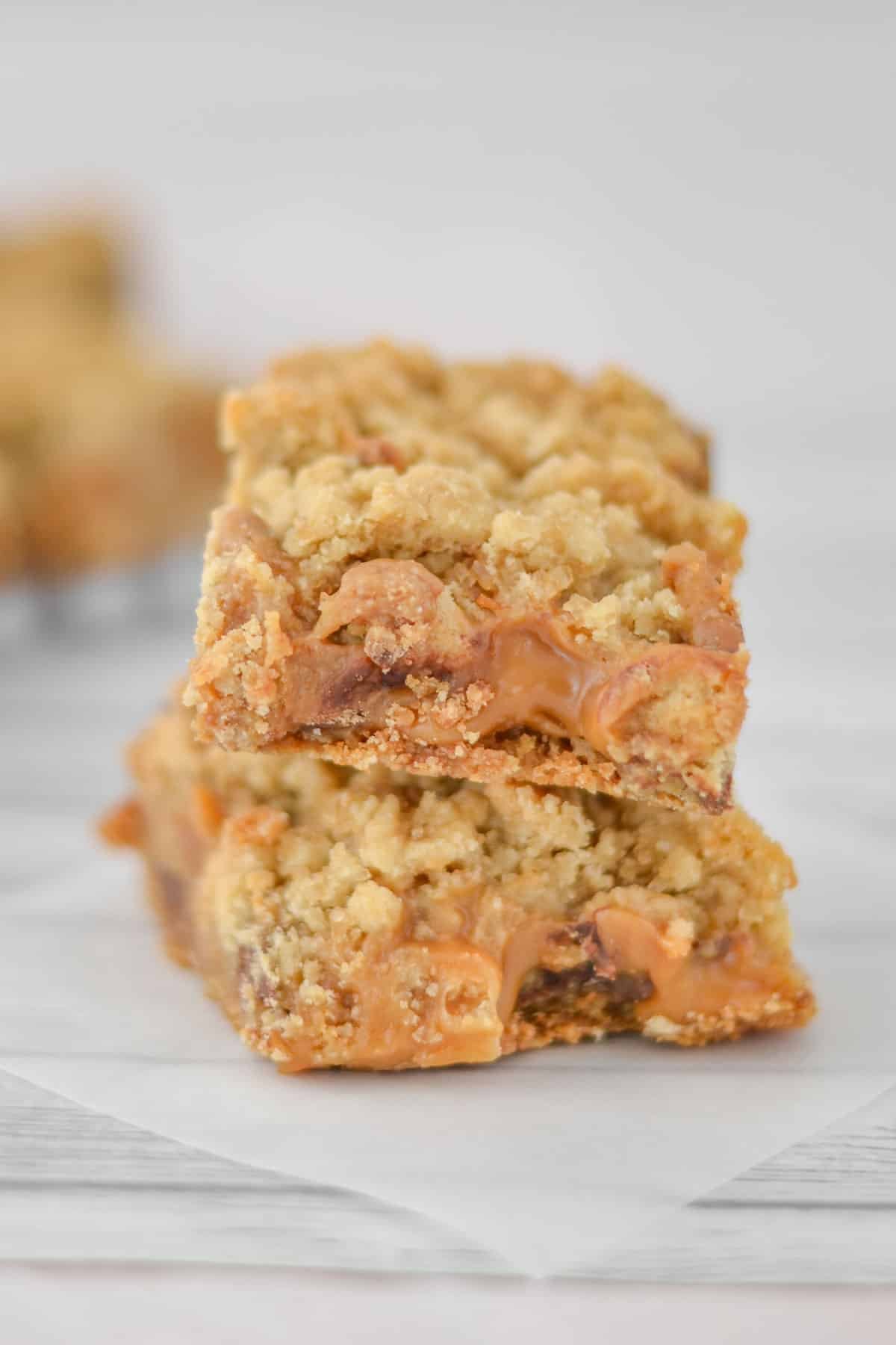 A close up of a stack of two Carmelita dessert bars