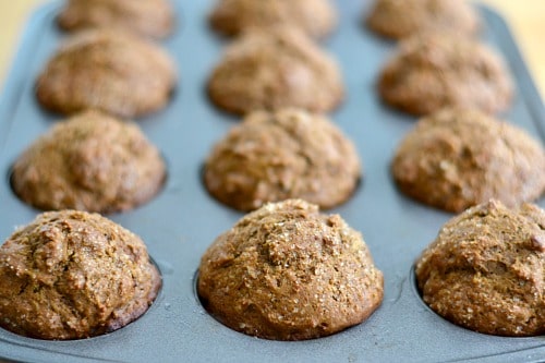 a muffin tin full of coffee cake muffins