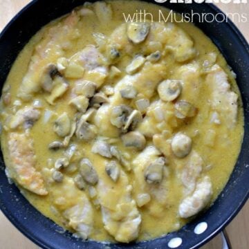 Honey Mustard Chicken with mushrooms recipe in a black pan