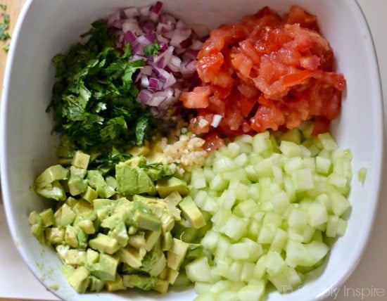 Cucumber Avocado Salsa Ingredients in a bowl - To Simply Inspire Cucumber Avocado Salsa Ingredients in a bowl - To Simply Inspire