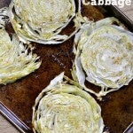 Baked Cabbage slices on a baking sheet