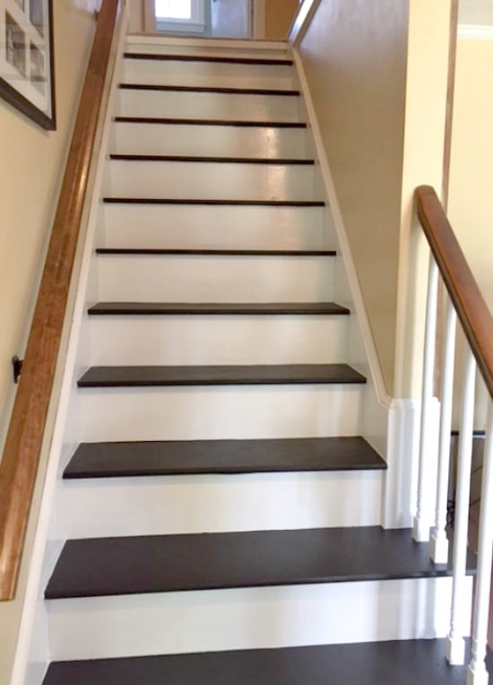 a black and white painted wood staircase