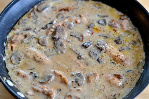 cream mushroom and chicken tenders in a pan