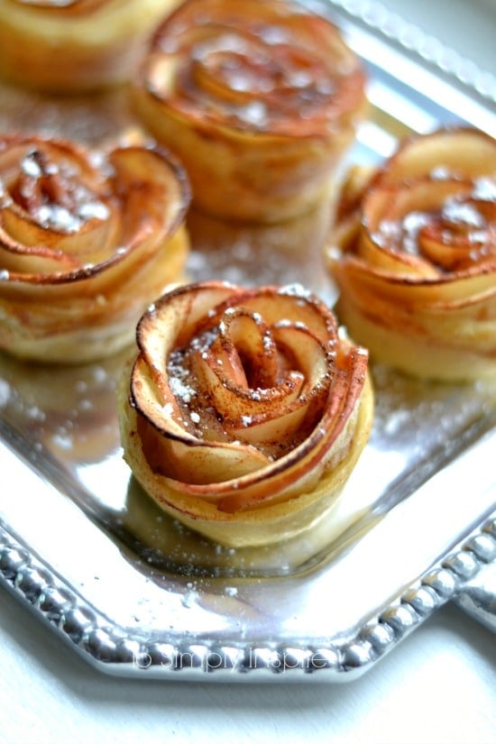 close-up of Apple Rose Puffed Pastries recipe on a silver platter.