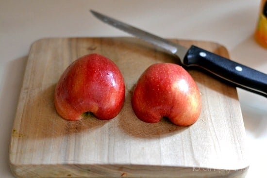 Cut apples on a cutting board 