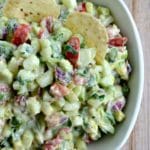 cucumber avocado salsa recipe in a white bowl