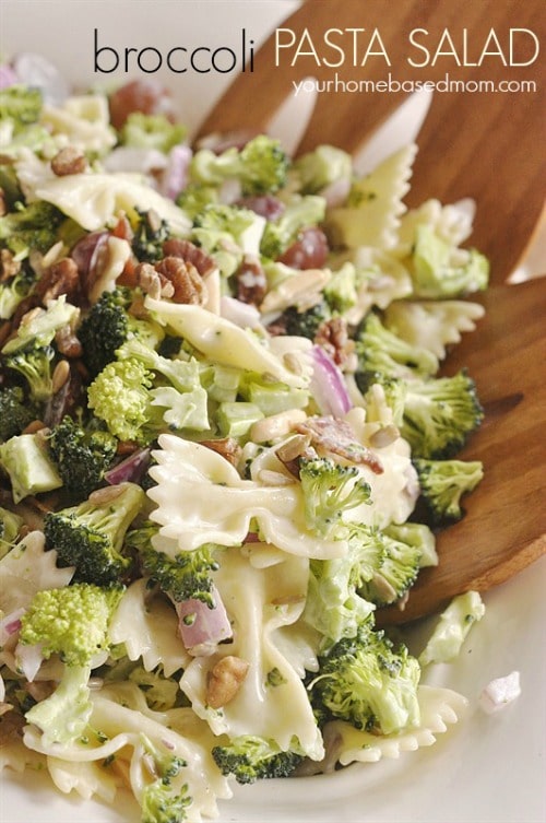 A bowl filled with bowtie pasta and broccoli