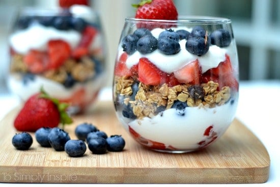 a strawberry, blueberry, granola and yogurt parfait 