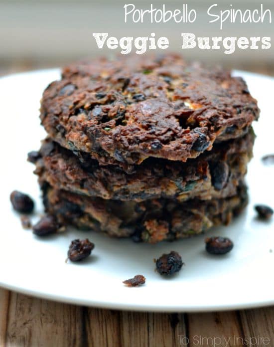 A piece of chocolate cake on a plate, with Spinach and Veggie burger