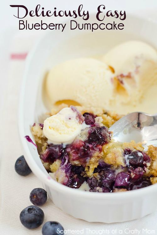 blueberry dump cake topped with vanilla ice cream 