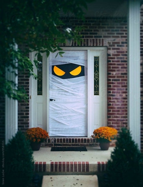 front door decorated like a mummy