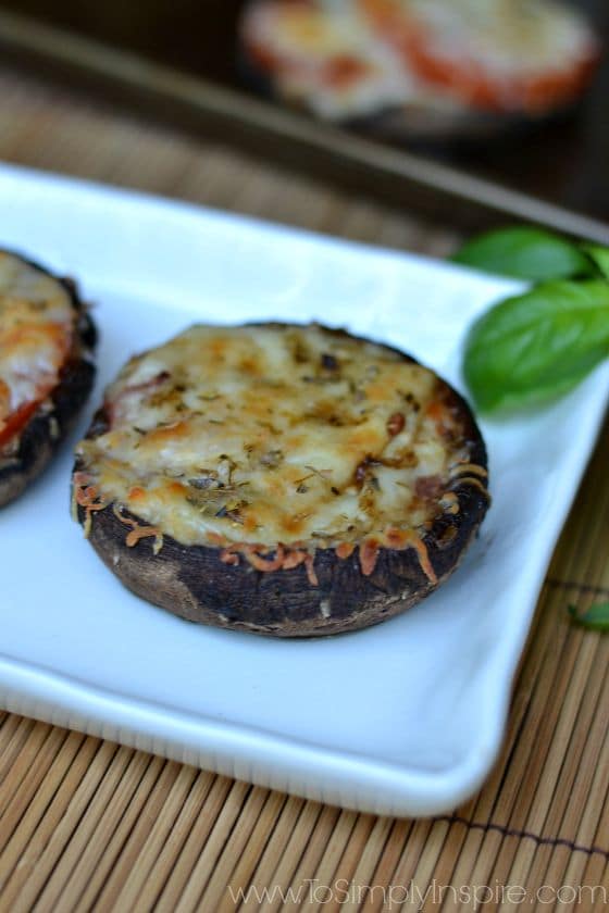 closeup of a portobello mushroom topped with cheese