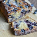 blueberry lemon bread with a slice cut