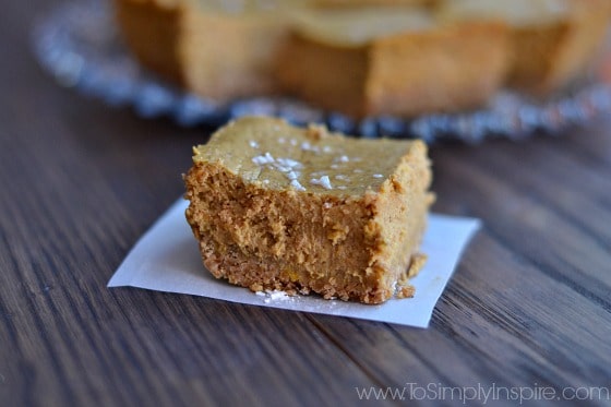 A piece of pumpkin cheesecake sitting on a table