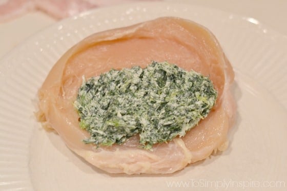 Raw Chicken Breast stuffed with spinach cream cheese mixture.