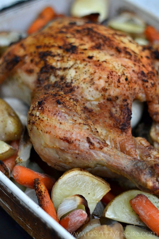 A close up of a cooked chicken drumstick 