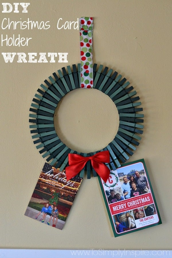 a wreath made out of painted green clothespins