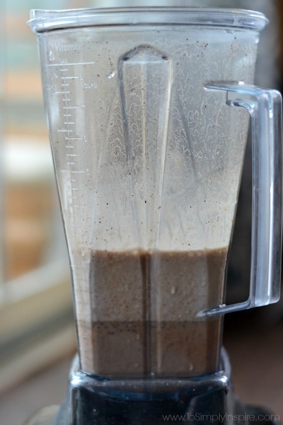 A blender filled with mocha smoothie